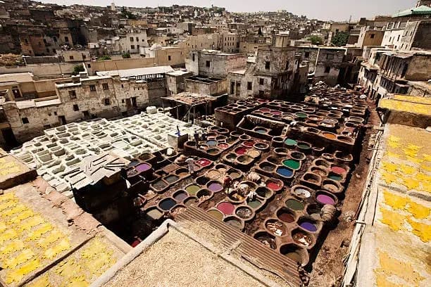 The Chouara tanneries in Fez, seen from above, with vats of coloured dye